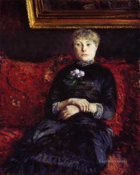 ギュスターヴ・カイユボット Painting - 赤い花柄のソファに座る女性 ギュスターヴ・カイユボット
